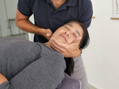 Physiotherapist applying manual therapy to the cervical spine